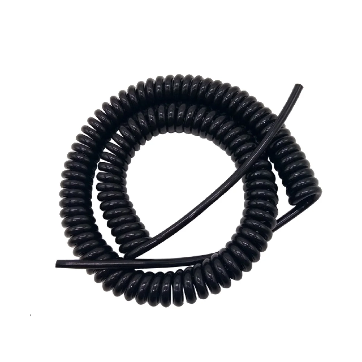 Black retractile power cord in its retracted coiled state